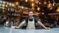 Happy business owner working at a restaurant