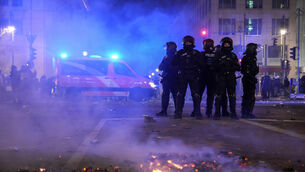 The German government has condemned a series of incidents on New Year’s Eve in which police officers and firefighters were attacked and injured, mostly with fireworks (Ebrahim Noroozi/AP)