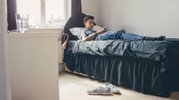 Teenager using Smartphone at Home
