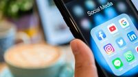 BANGKOK, THAILAND- 26 June 2019 : Hands of man use Iphone 7 plus with social media application of facebook, youtube, google sear