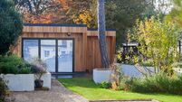 Bespoke Western Red Cedar Clad Home Garden Office with Bifold Doors, Slate Terrace, Barbecue and Firepit with Raised Flower Beds