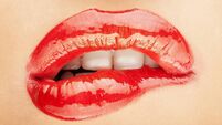 Woman biting her lip