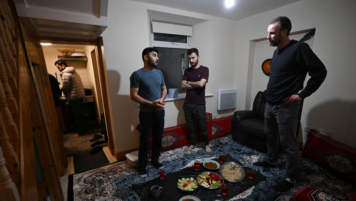 Colin Sheirdan, right, chats with men about their connection to their faith. Picture: Ray Ryan Colin Sheirdan, right, chats with men about their connection to their faith. Picture: Ray Ryan