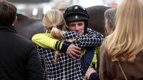 Sean Flanagan hugs the late Michael O’Sullivan’s girlfriend Charlotte Giles after winning on Marine Nationale 12/3/2025