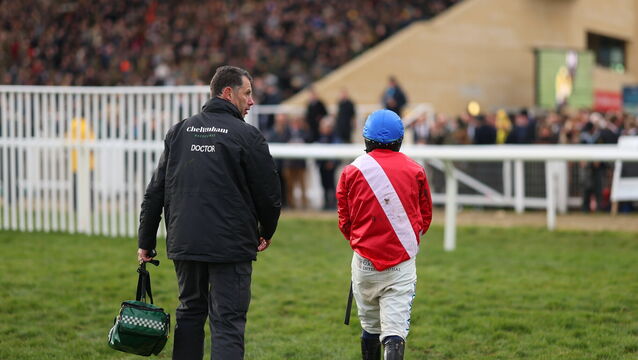 <p>Jockey Darragh O'Keeffe walks back after being unseated at the last by Quilixios during The BetMGM Queen Mother Champion Steeple Chase. Pic: Harry Murphy/Sportsfile</p>