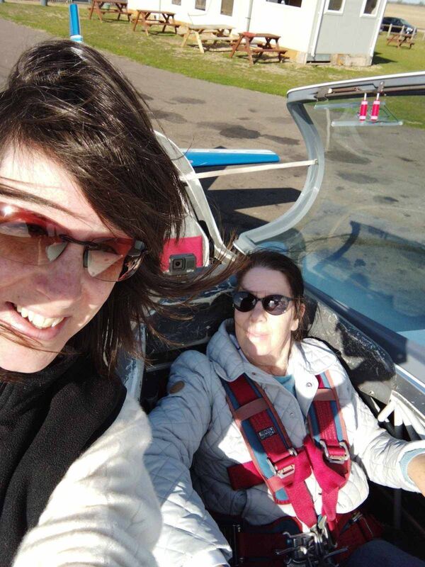 Aerobatic stunt pilot Laura Russell (left) after taking her mother Mary flying in an Extra 200 aerobatic aircraft. Aerobatic stunt pilot Laura Russell (left) after taking her mother Mary flying in an Extra 200 aerobatic aircraft.