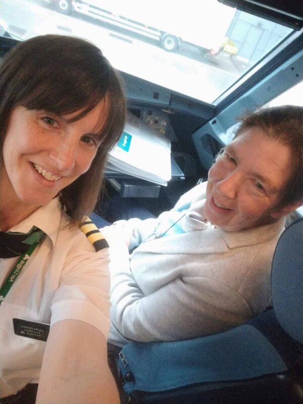 Pilot Laura Russell with her mother Mary in the flight deck of the Airbus A321LR after flying her home from the US. Pilot Laura Russell with her mother Mary in the flight deck of the Airbus A321LR after flying her home from the US.
