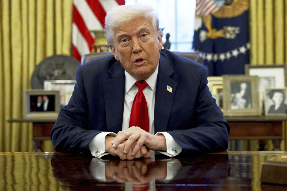President Donald Trump speaks to reporters in the Oval Office at the White House in Washington, Wednesday, March 26, 2025. (Pool via AP)