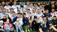 Monaghan celebrate with the trophy 29/3/2025