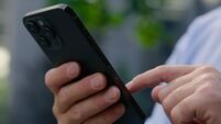 Close up Caucasian male hands arms holding mobile phone scrolling screen social media app unrecognizable man unknown businessman