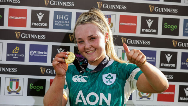 <p>Ireland's Aoife Dalton celebrates with the player of the match award. Pic: Tom Maher/Inpho</p>
