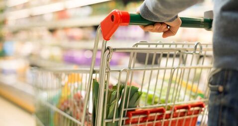 Detail of a man shopping in supermarket