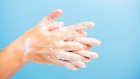 woman washing hands with soap have foam