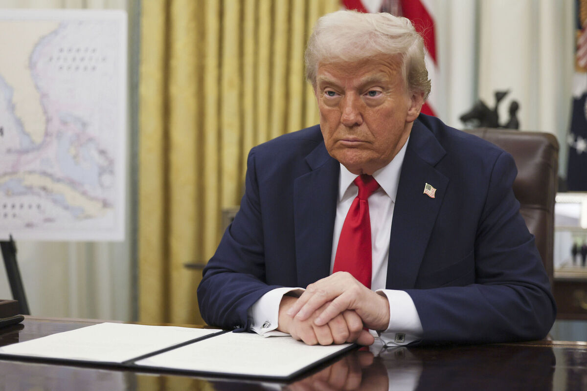President Donald Trump listens to a question from a reporter before signing an executive order in the Oval Office of the White House in Washington, Monday, March 31, 2025. (Pool via AP) President Donald Trump listens to a question from a reporter before signing an executive order in the Oval Office of the White House in Washington, Monday, March 31, 2025. (Pool via AP)