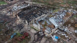 <p> A farm lies in ruins after being destroyed during fighting between Ukrainian and Russian occupying forces in Kharkiv. Picture: Carl Court/Getty Images)</p>